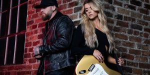 Lindsay Ell and Brantley Gilbert together for "What Happens in a Small Town"