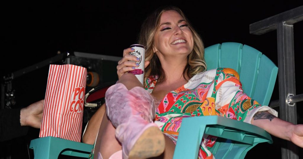 Kelly Prescott enjoying backstage