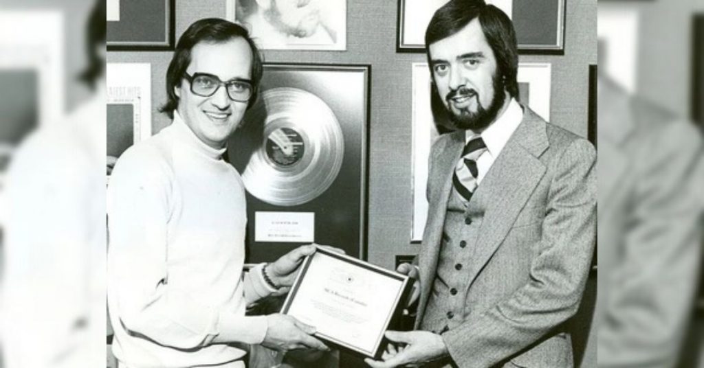 Mel Shaw, left received an award from MCA Canada in 1973 ( courtesy of Stampeders)