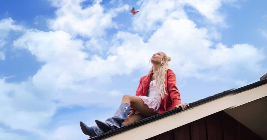 Madeline Merlo on the roof