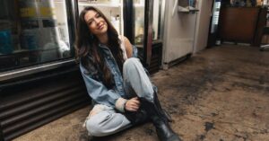 Canadian Country singer Robyn Ottolini Sitting On The Floor