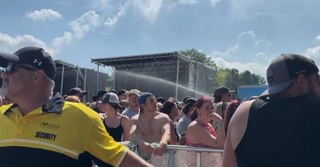 Hosing off the crowd to keep people cool